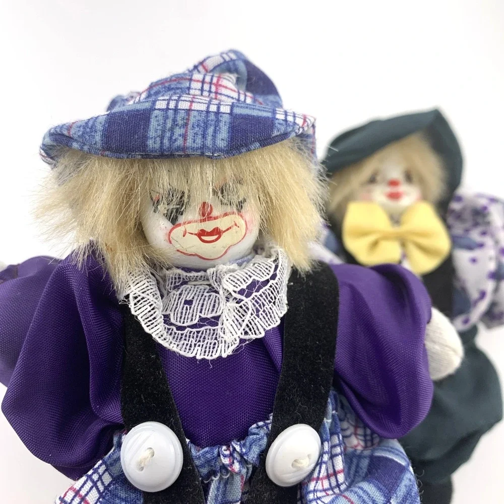 The Unbranded Brand dolls faces clown